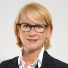 Frau mit Blonde Haare und Brille