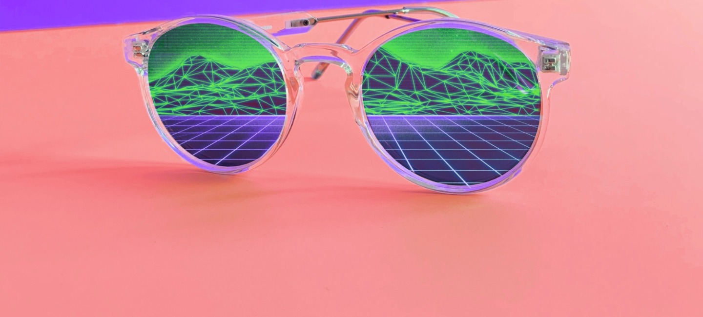 mirrored sunglasses with abstract graphic o pink background
